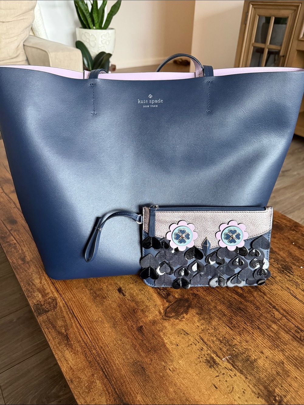 kate spade navy tote with lilac color interior and floral-accent wristlet